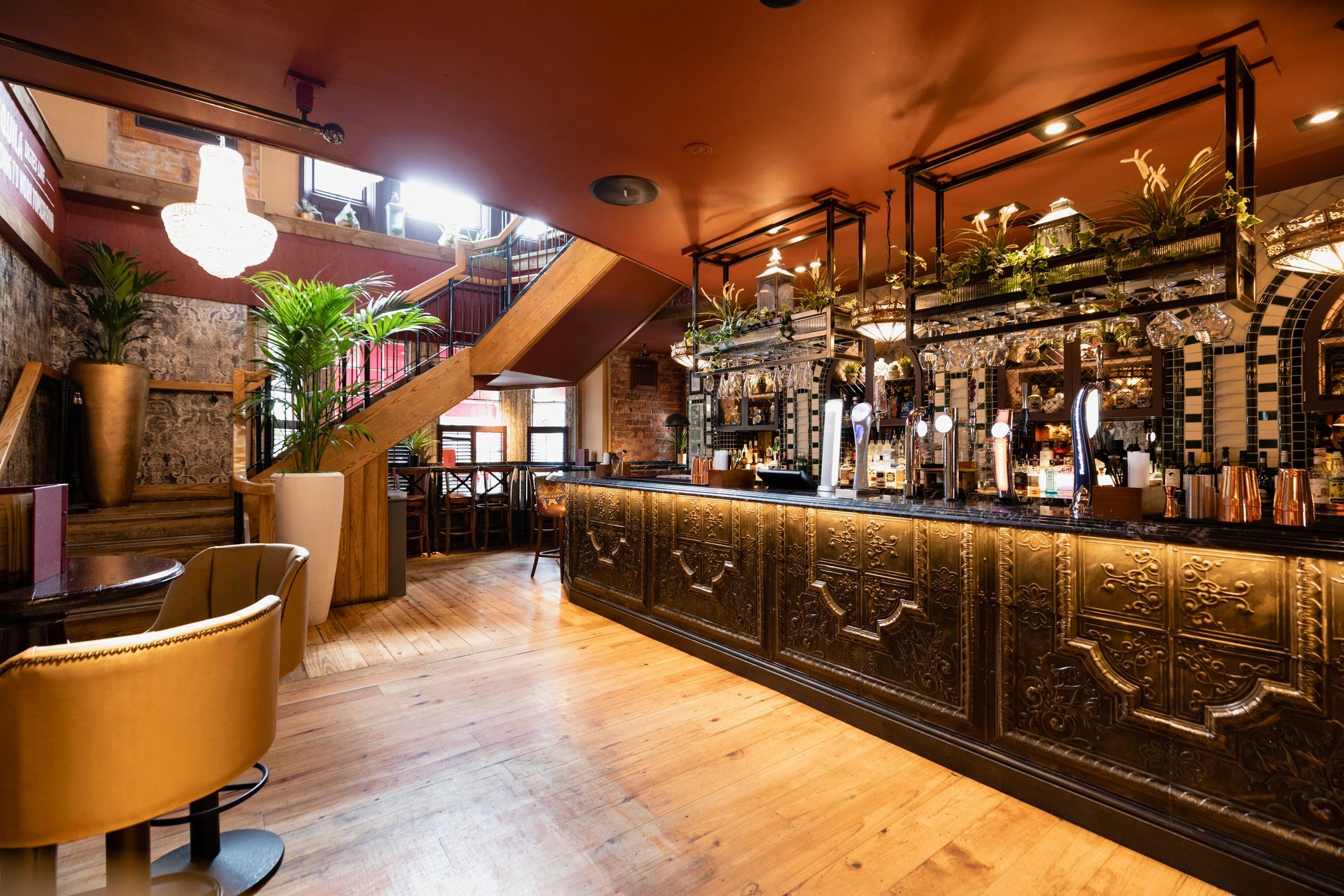 Club lounge bar with illuminated shelves and seating