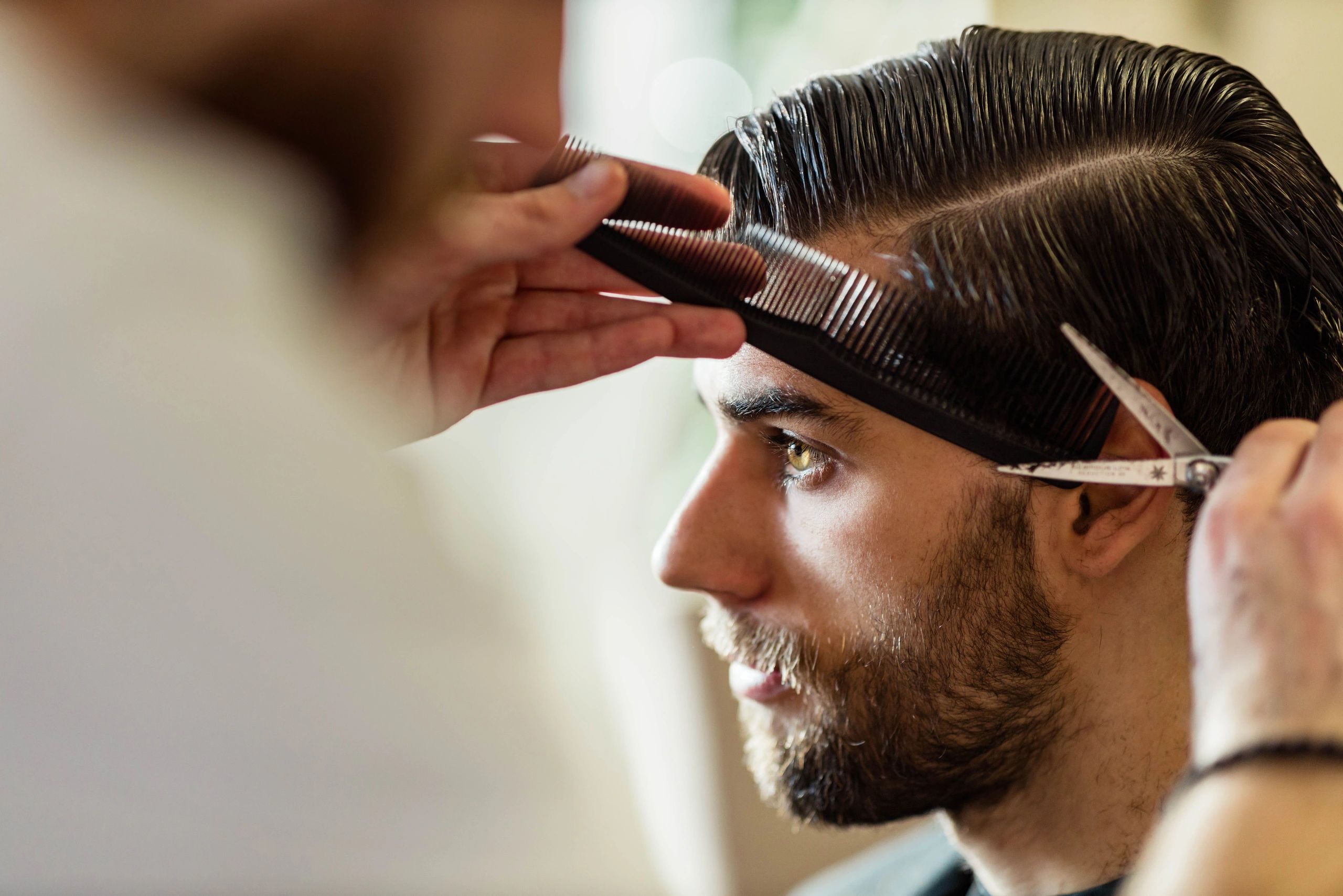 Haircut in progress at a salon