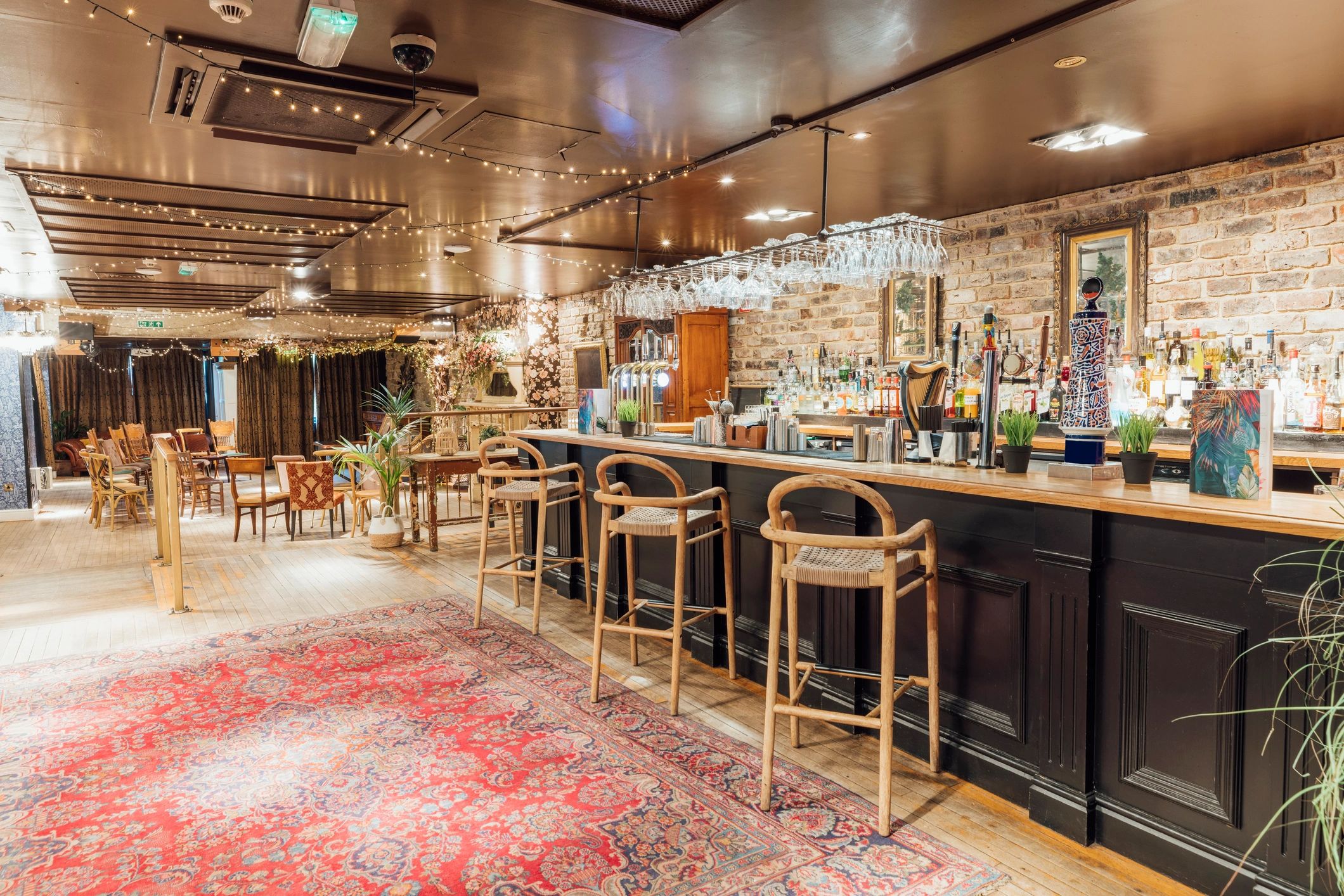 Rustic bar and dining interior with warm lighting