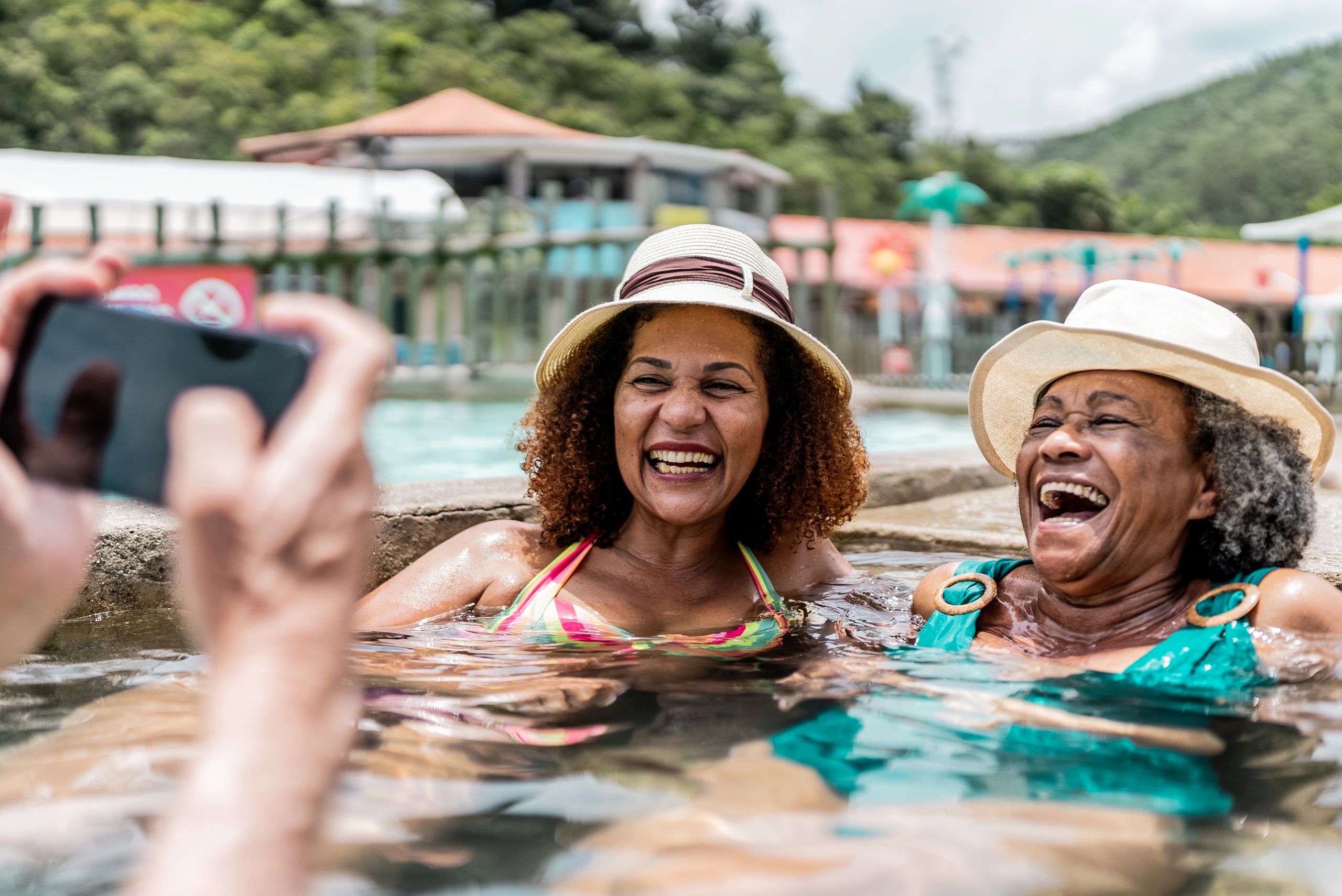 Mother and daughter at a swimming pool